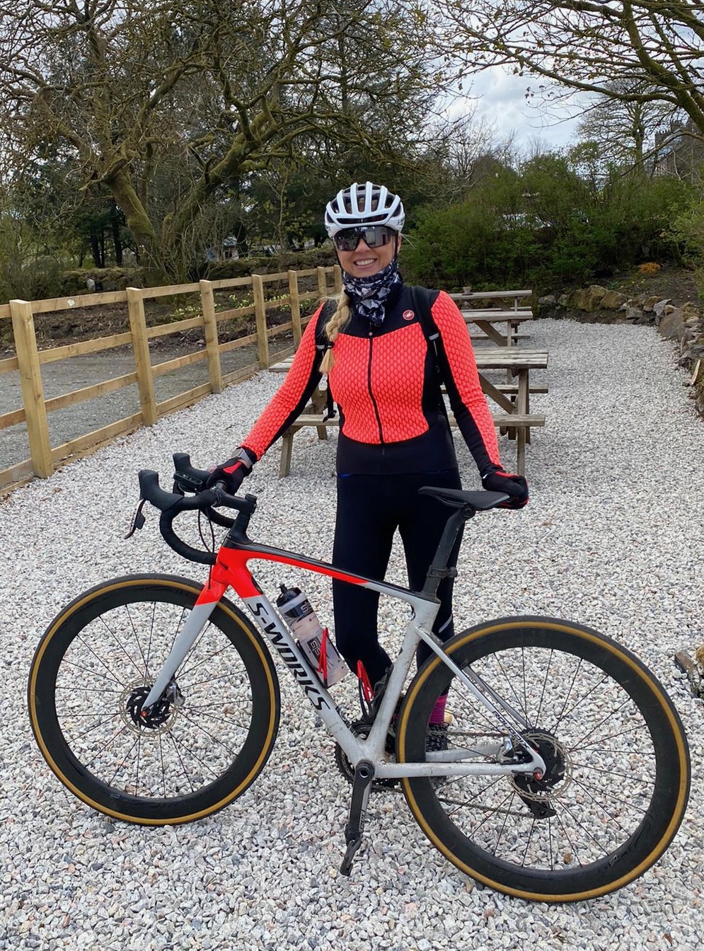 Cyclist Amanda Barnes with her road bike